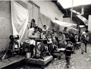 Cobblers working in a Lima market  / TAFOS, Peru, 1989